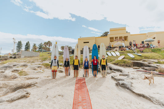 Pink Shell Trimmers surfboards lined up at Trim Club in Cronulla. Photo by Sam Venn Photography, with Pink Shell Trimmers and Cameron Staunton.