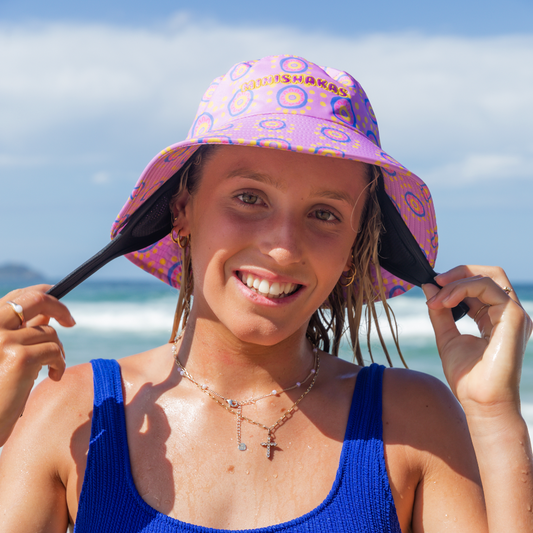 Leihani Zoric wearing plow surf co surf hat designed by Leihani Zoric Indigenous Australian artist and surfer to support her surfing goals